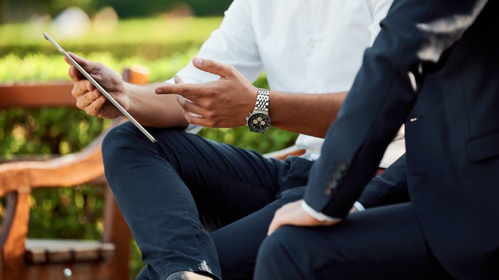 two people sitting during day